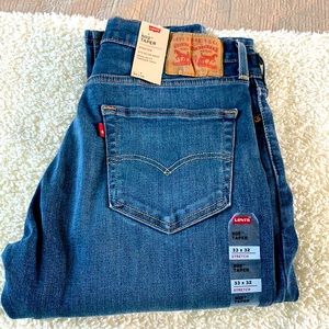Levi 502 Taper Jeans.  33 x 32 Stretch. Dark Blue.